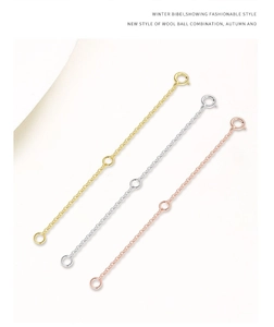 Macro detail of adjustable S925 sterling silver extender chains in gold, silver, and rose gold