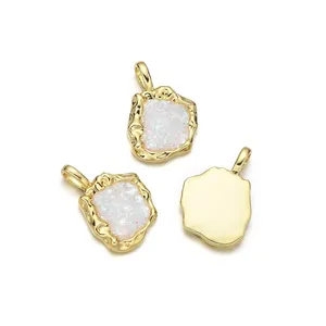Irregular geometric gold-plated copper charms with sparkling white mineral inlay