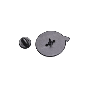 Detailed view of the matte black metal clutch back and pin fastener for brooches