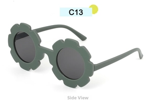 Side view of matte army green flower-shaped sunglasses for kids with grey lenses
