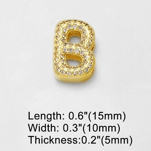 Detailed macro view showing the thickness and size of the golden Zirconia letter B charm