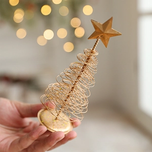 Elegant champagne gold spiral iron Christmas tree with star topper for tabletop decor
