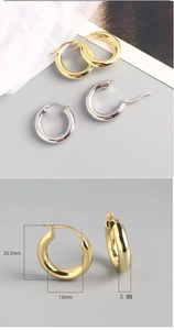 Detailed view of 5mm thick gold and silver hoop earrings with size measurements