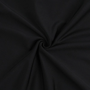 Macro shot of high-quality black textile fabric with elegant drapes and smooth texture