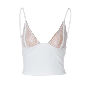 Détails de la dentelle florale blanche complexe et des fines bretelles du haut caraco
