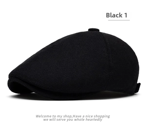 Detailed view of black wool beret cap showing premium texture and neat stitching details