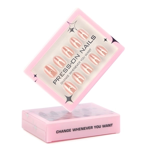 Pink mirror press-on nails with golden heart pattern in star-decorated boxes
