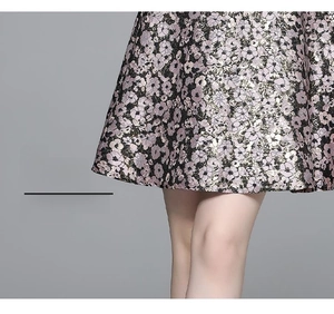Detail of beaded floral embroidery on pink purple waist-slimming elegant dress