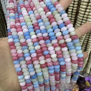 Macro shot of colorful flat round abacus natural stone beads for DIY jewelry making