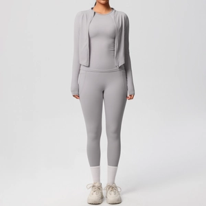 Detailed view of light gray 3-piece yoga set featuring slim fit jacket and high waist pants