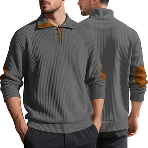 Detail of grey men's henley sweatshirt featuring elbow patches and a buttoned stand collar