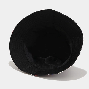 Cappello da sole reversibile con motivo geometrico, fodera nera e tesa cucita