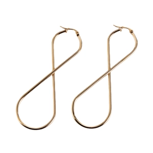 Minimalist golden titanium steel earrings with infinity figure-eight shape on white background