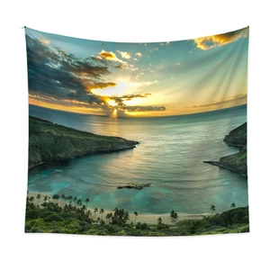 Détail de la tapisserie bohème avec coucher de soleil tropical et texture de tissu fine
