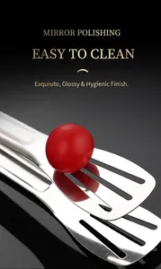 Close-up of mirror-polished stainless steel food tongs with hollow head for oil drainage