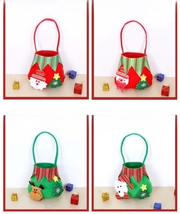 Detailed view of four Christmas gift bags featuring Santa, snowman, elk, and bear patterns