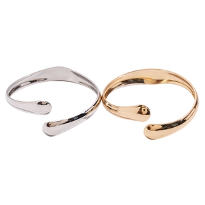 Minimalist irregular open oval bracelets in gold and silver finish with teardrop ends