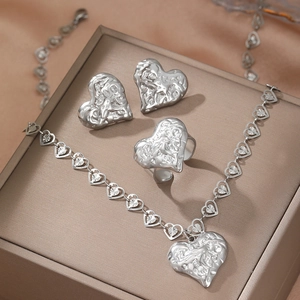 Vintage irregular heart jewelry set with textured silver necklace ring and earrings