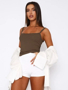 Close-up of brown ribbed camisole with delicate lace trim on neckline and straps