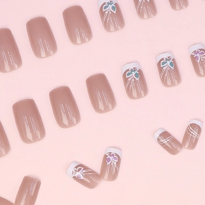 French style nude pink press-on nails with purple floral patterns and white tips