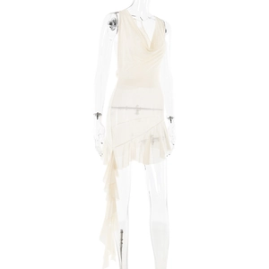 Detail of white V-neck dress featuring delicate cowl neck and asymmetrical ruffled hemline