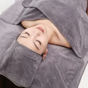 Detail of soft dark grey coral fleece bath towel set including headwrap and body wrap