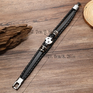 Detail view of woven leather soccer bracelet with 21cm length and 2.2cm ball charm