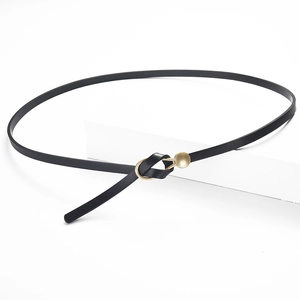 Minimalist black leather skinny belt for women with elegant gold metal buckle