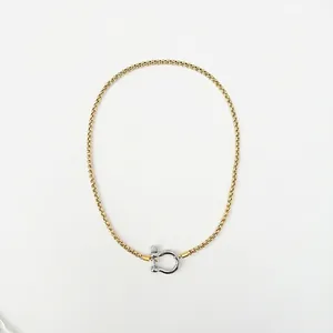 Detail of 4mm 18K gold plated stainless steel pearl chain with U-shaped carabiner clasp