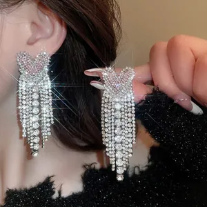 Sparkling long heart rhinestone fringe earrings featuring pink crystals and silver tassels