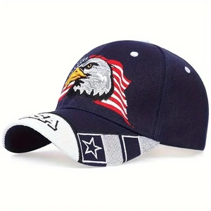 Detail of eagle and USA flag embroidery on navy blue cotton baseball cap crown