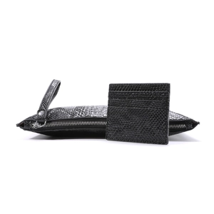 Detail of black 3D python pattern A4 envelope clutch and matching card holder set