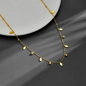 Golden titanium steel necklace with Hamsa charms and sparkling zircon pendants