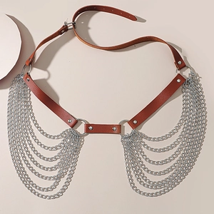 Detail of brown PU leather body chain with silver multilayered metal tassel chains