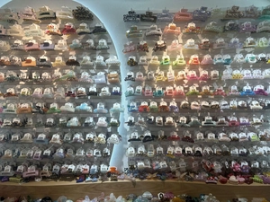 Massive collection of colorful claw clips with floral and leopard patterns on display