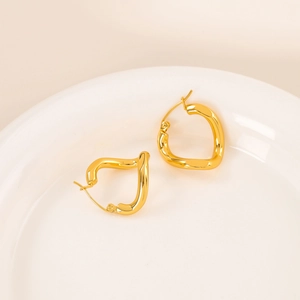 Irregular twisted geometric gold hoop earrings in stainless steel for women