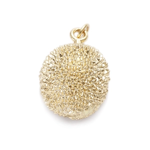 Detailed view of round golden pendant with fine granulated texture and embossed design