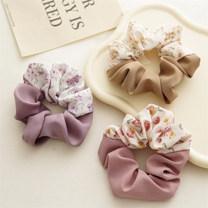 Floral and solid fabric patchwork scrunchies in lavender, caramel, and dusty pink colors