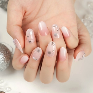 Pink gradient press on nails with silver snowflakes and pearls for winter style