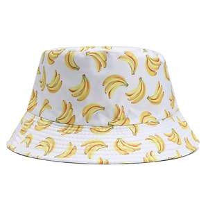 Chapeau bob réversible blanc avec imprimé bananes jaunes pour protection solaire