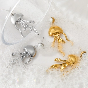 Artistic jellyfish earrings in gold and silver steel with pearl studs on bubbles