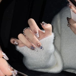 Luxurious long coffin press-on nails with silver glitter french tips and 3D floral accents
