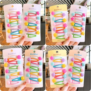 Set of colorful macaron hair clips with cute star and heart shapes for girls