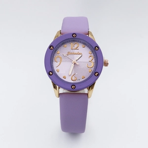 Detailed flat lay of purple leather watch with gold heart indexes and 3733-1 model dial