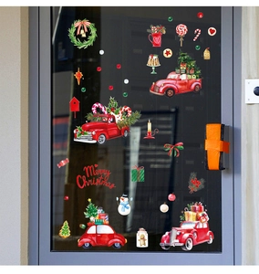 Detailed Christmas window stickers showing a red vintage truck and snowman on glass