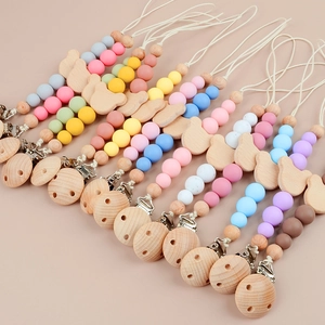 Handmade wooden bear and silicone bead pacifier clip set in various pastel colors