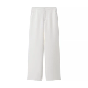 Detail view of white high-waisted wide-leg trousers with smooth draping fabric texture