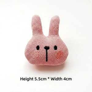 Close-up of a pink knitted rabbit doll head for DIY accessories, size 5.5cm by 4cm