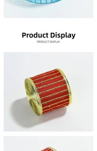Detail of red and gold striped Christmas ribbon roll with sparkling sequin finish