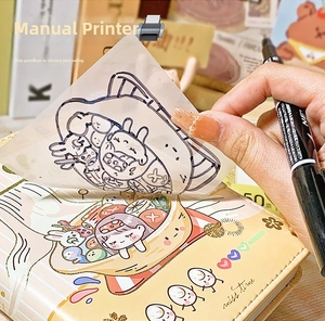 Detailed view of DIY transparent sticky notes with cartoon illustrations for journaling